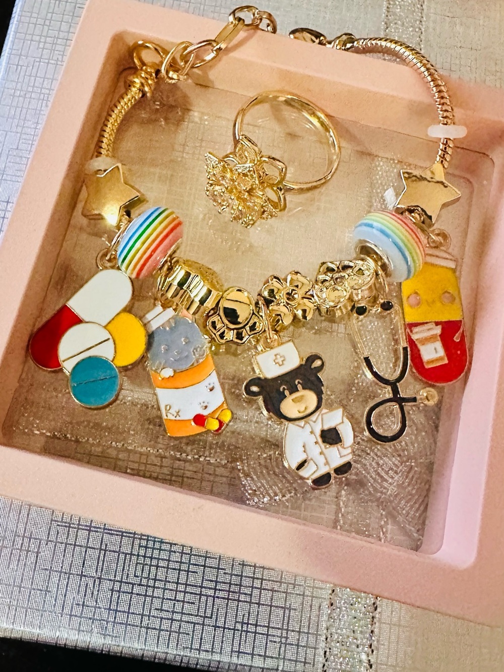 Medical Charm Bracelet with Rainbow Beads and a Ring